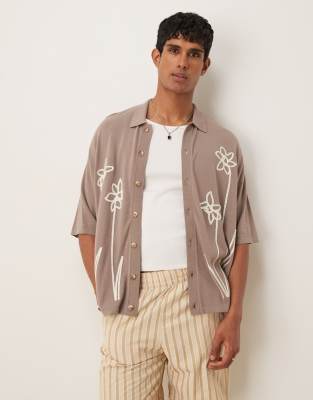 relaxed knit button through polo with floral pattern in brown