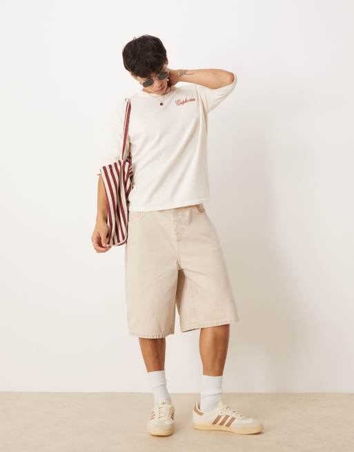 ASOS DESIGN relaxed knit crew neck T-shirt with chest embroidery in white