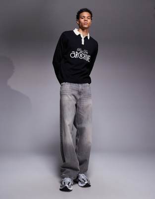 Asos Design Relaxed Knit Long Sleeve Polo Shirt With Chest Graphic In Blue