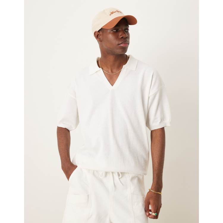 ASOS DESIGN relaxed knit polo shirt with notch neck in white