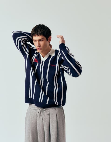 ASOS DESIGN relaxed knit striped notch neck polo shirt with chest embroidery in navy - view 1