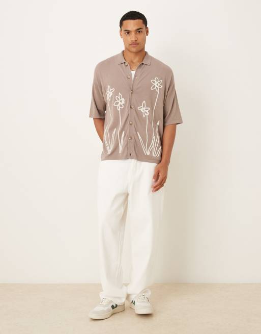 ASOS DESIGN relaxed knitted button-through polo shirt with floral pattern in brown