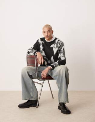 ASOS DESIGN ASOS DESIGN relaxed knitted crew neck jumper in black with floral pattern