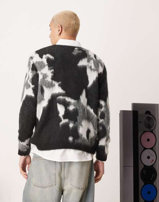 ASOS DESIGN relaxed knit crew neck sweater in black with floral pattern