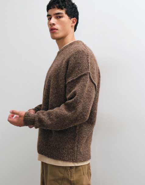 ASOS DESIGN relaxed knitted exposed seam crew neck sweater in brown - view 1