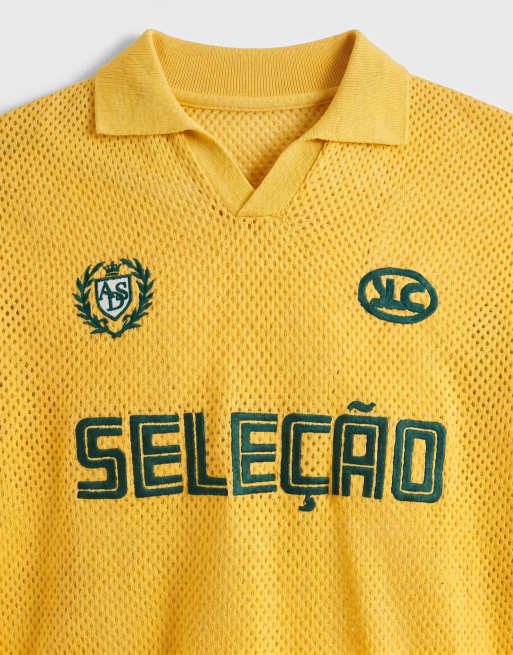 ASOS DESIGN relaxed knitted football‑style notch neck with embroidery in yellow, 8 of 9