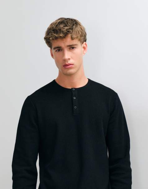 ASOS DESIGN relaxed knitted long sleeved texture henley t-shirt in black - view 1