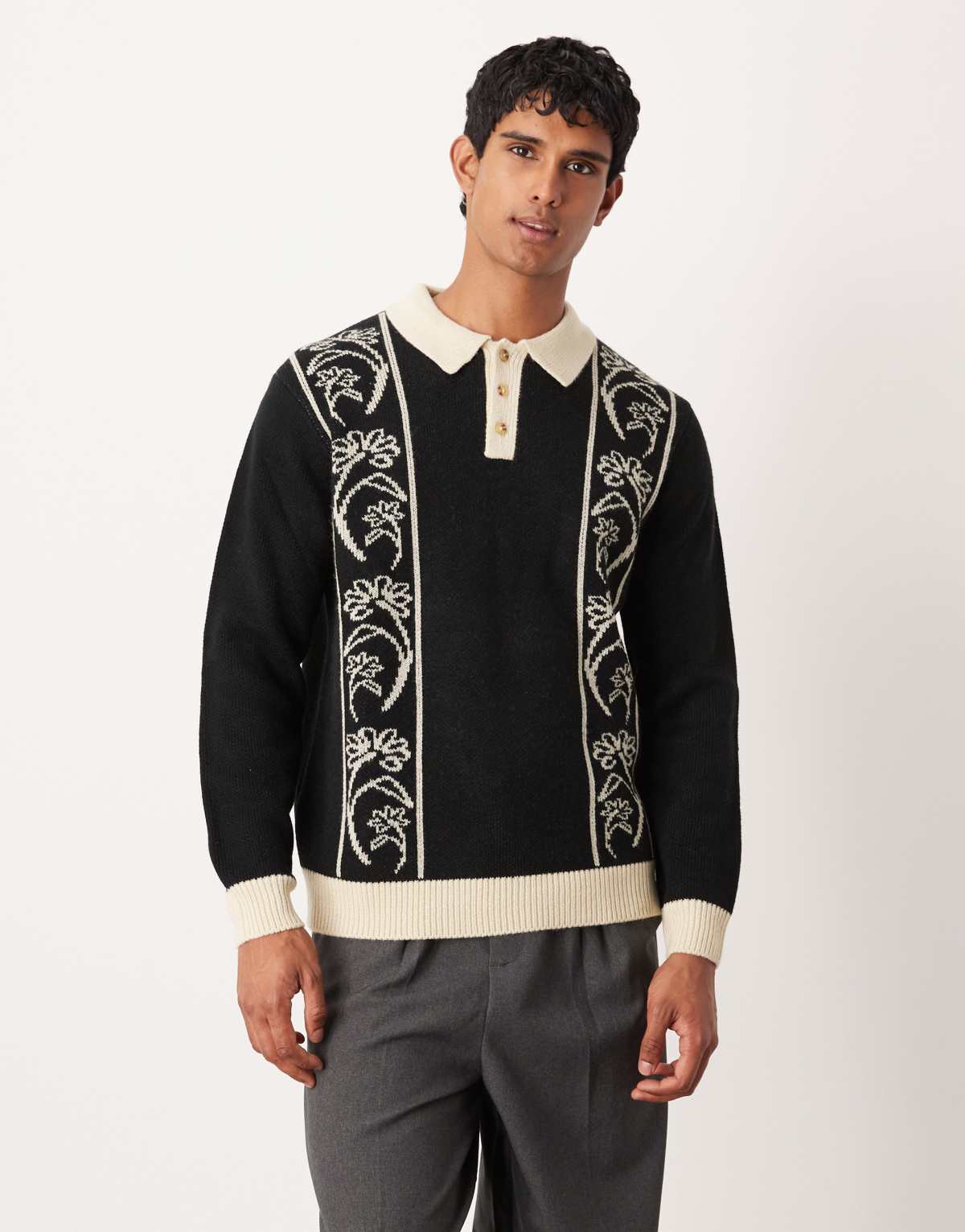 ASOS DESIGN relaxed knitted polo in black with floral pattern
