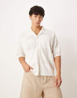asos ASOS DESIGN relaxed knitted textured floral button through polo in cream