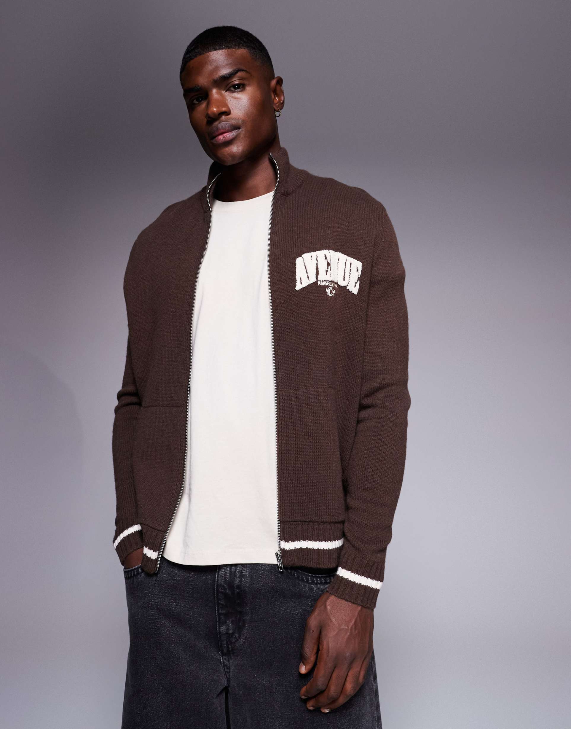 ASOS DESIGN relaxed knitted zip through track jacket with Marseille print in brown