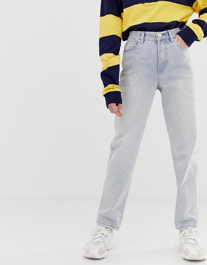 ASOS DESIGN relaxed leg boyfriend jeans in bleached blue wash with bum rip detail
