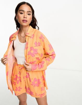 ASOS DESIGN relaxed shirt with dip hem with linen in orange and pink floral print