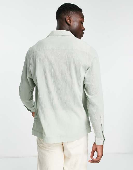 ASOS DESIGN relaxed linen shirt with pleats and four pocket detail