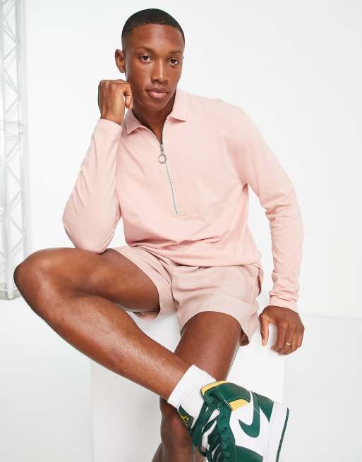 ASOS DESIGN relaxed long sleeve polo T-shirt with ring pull zip in pink 
