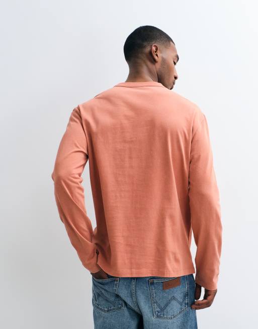 ASOS DESIGN relaxed long sleeve t-shirt in orange wash, 3 of 5
