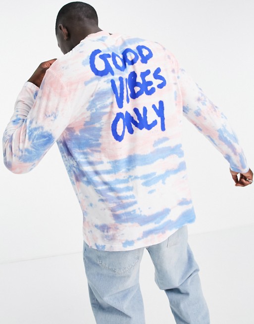 ASOS DESIGN oversized long sleeve t-shirt in tie dye with back text print