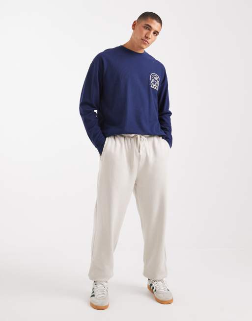 ASOS DESIGN relaxed long sleeve t-shirt with chest embroidery in navy waffle texture, 2 of 5