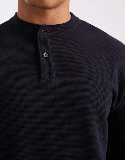 ASOS DESIGN relaxed long sleeve T-shirt with henley neck in black waffle
