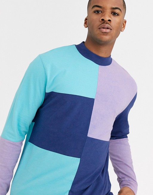 ASOS DESIGN relaxed long sleeve t-shirt with turtle neck and acid wash colour block in purple