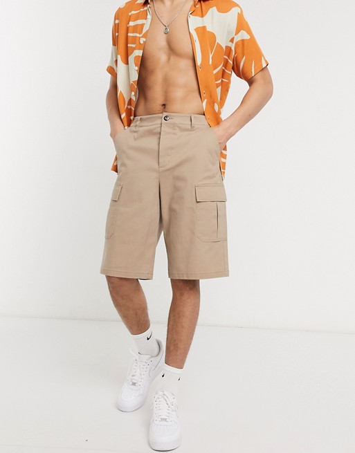 ASOS DESIGN relaxed longer shorts with cargo pocket in stone