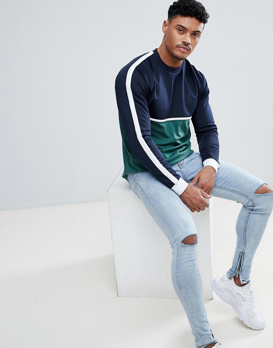 ASOS DESIGN relaxed longline long sleeve t-shirt with contrast yoke in woven fabric and curve hem-Green