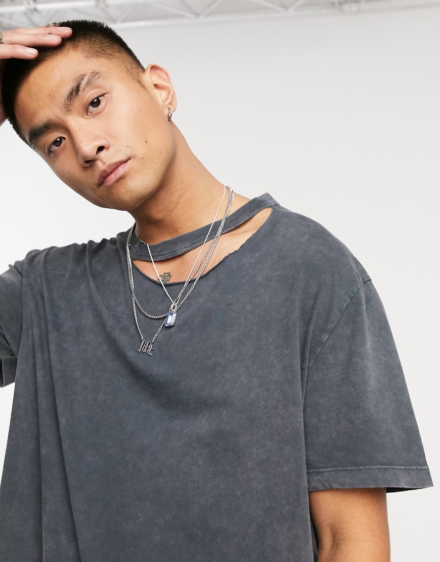 ASOS DESIGN relaxed longline t-shirt in black acid wash with disconnect neck