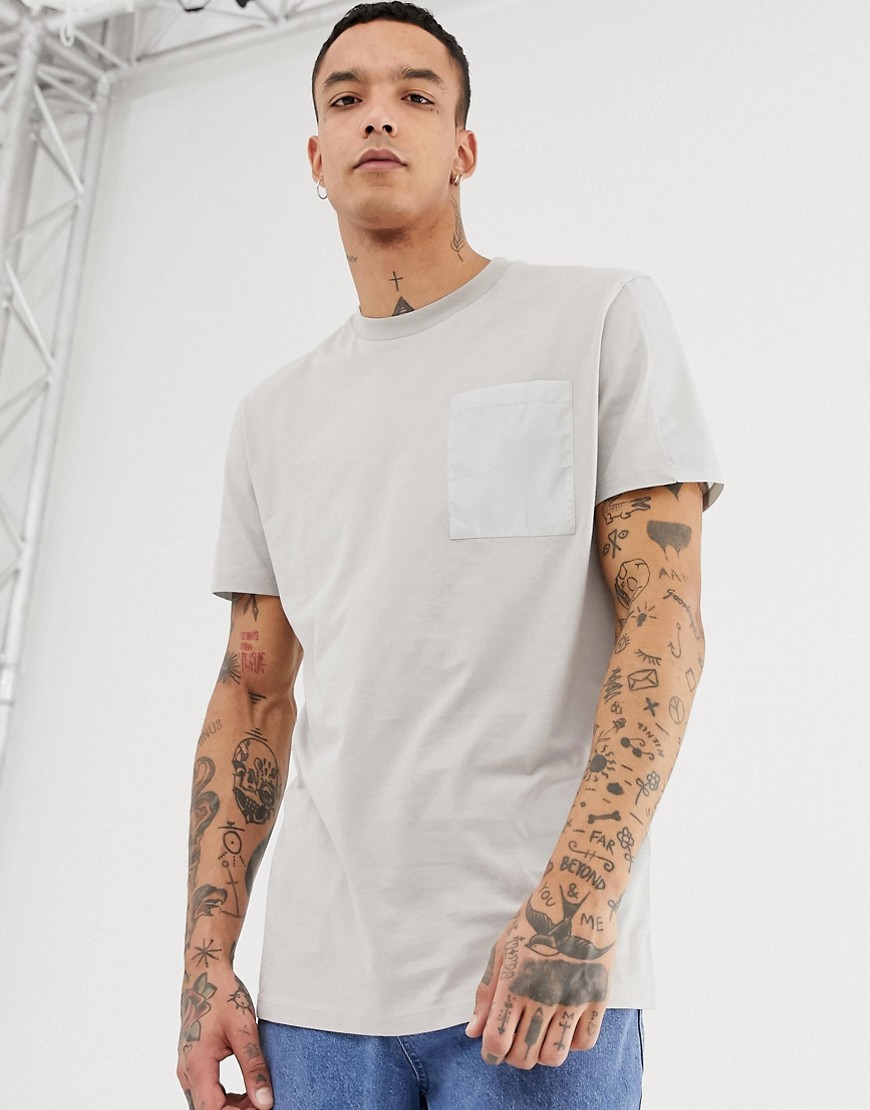 ASOS DESIGN relaxed longline t-shirt with contrast pocket and panels in woven fabric in grey