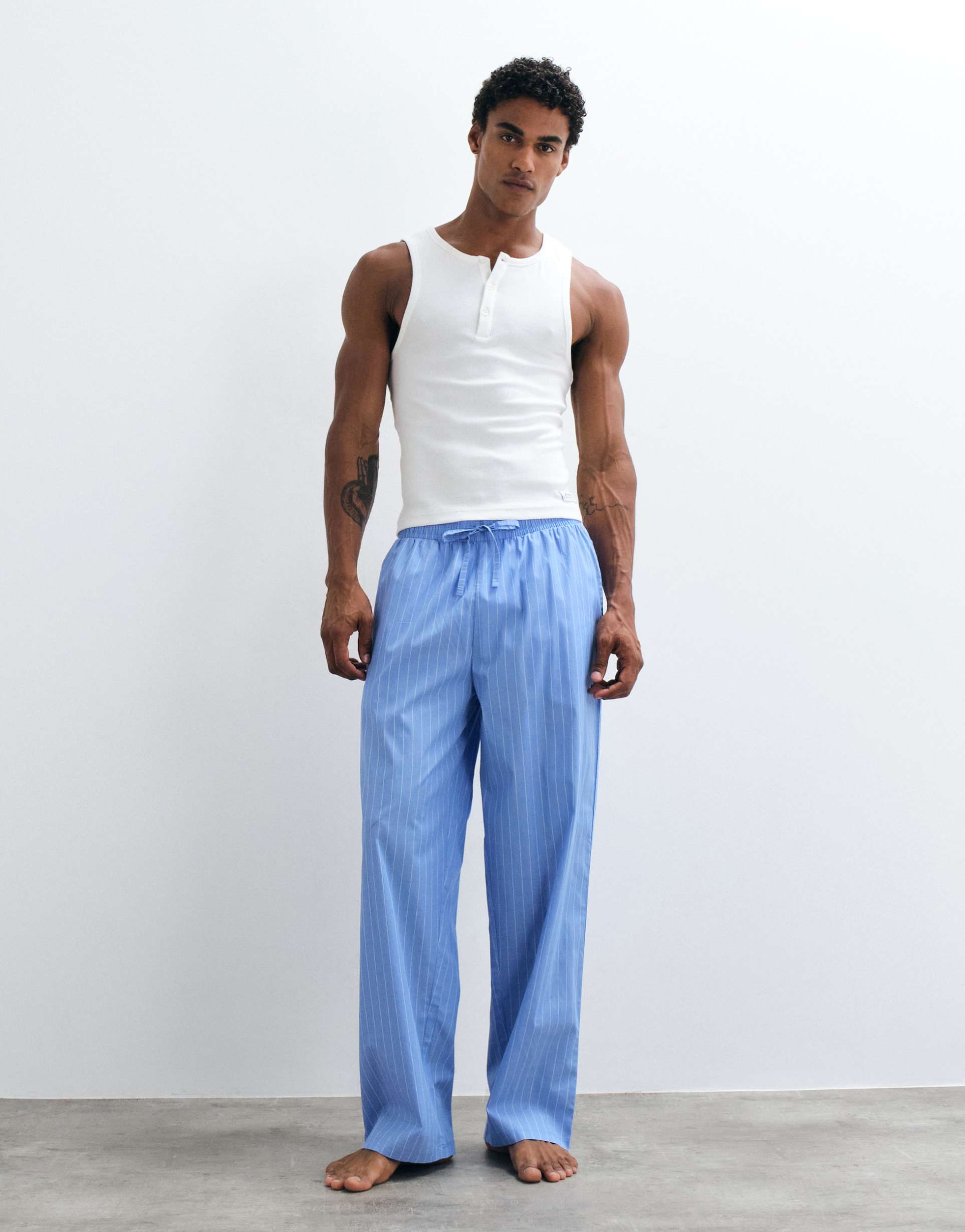 ASOS DESIGN relaxed lounge bottoms in blue with white stripe