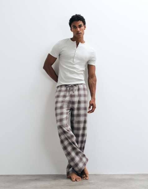 ASOS DESIGN relaxed lounge bottoms with check print in brown - view 1