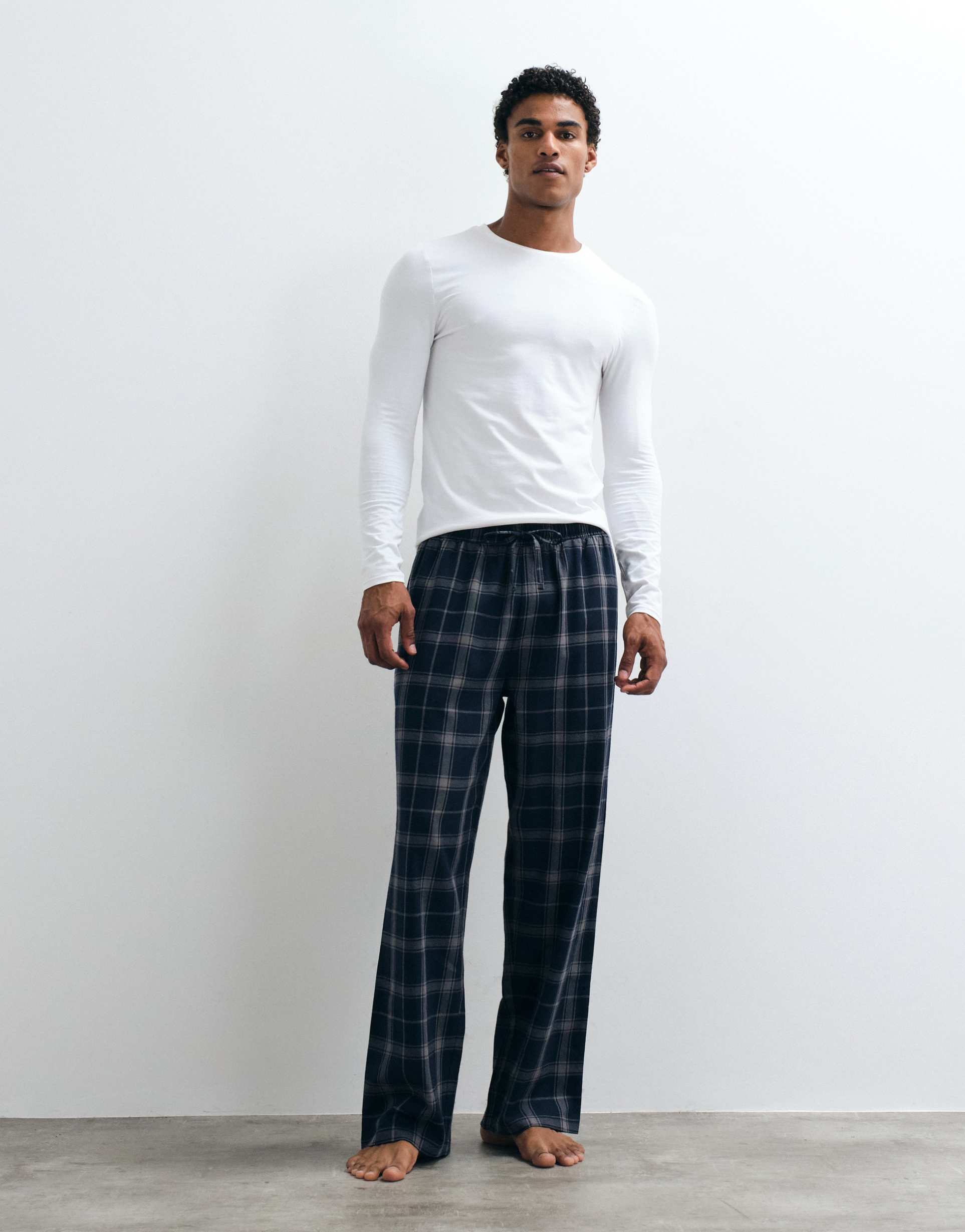 ASOS DESIGN relaxed lounge bottoms with plaid in navy