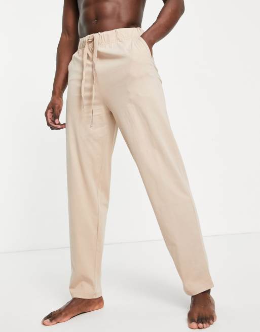 ASOS DESIGN relaxed lounge pants in beige with drawstring ASOS