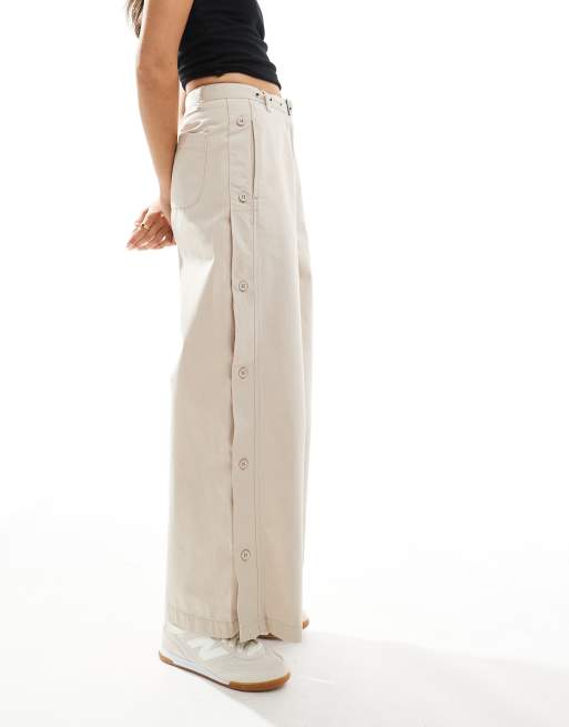 ASOS DESIGN relaxed pants with button detail in stone