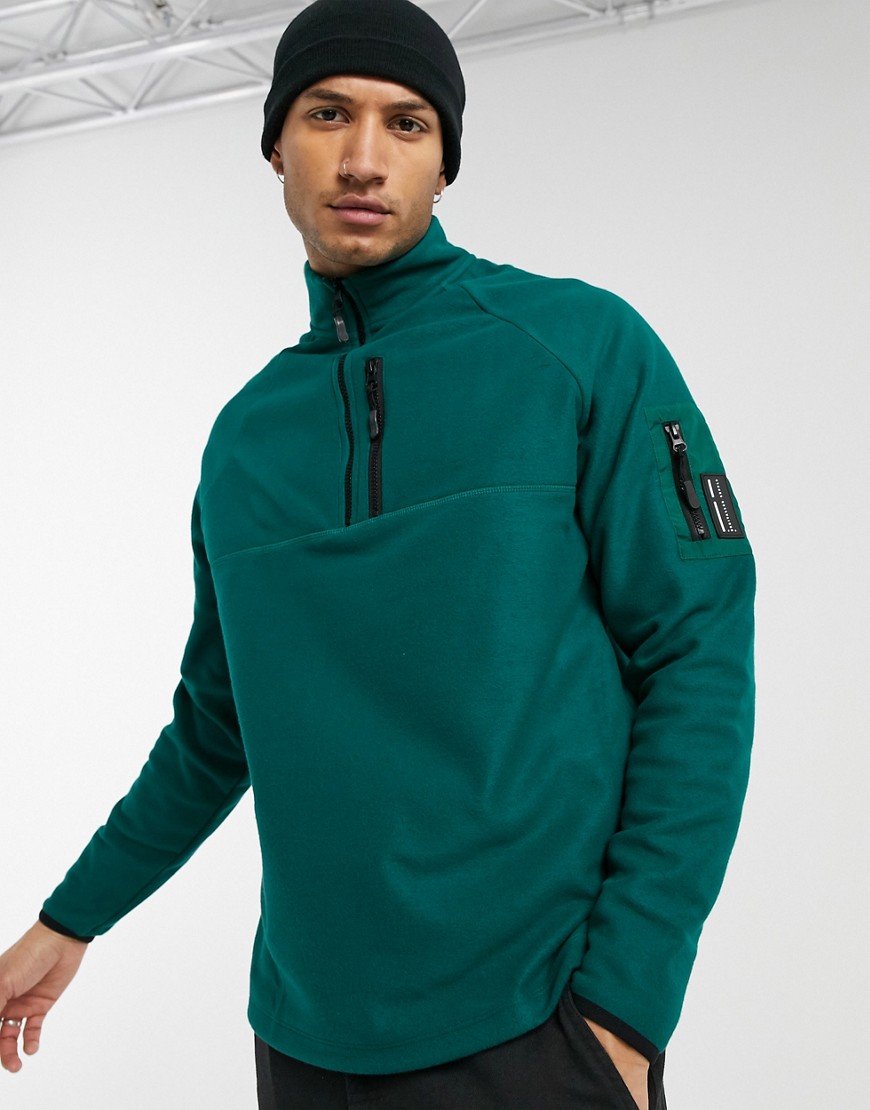 ASOS DESIGN relaxed polar fleece sweatshirt with half zip & MA1 pocket with badge-Green