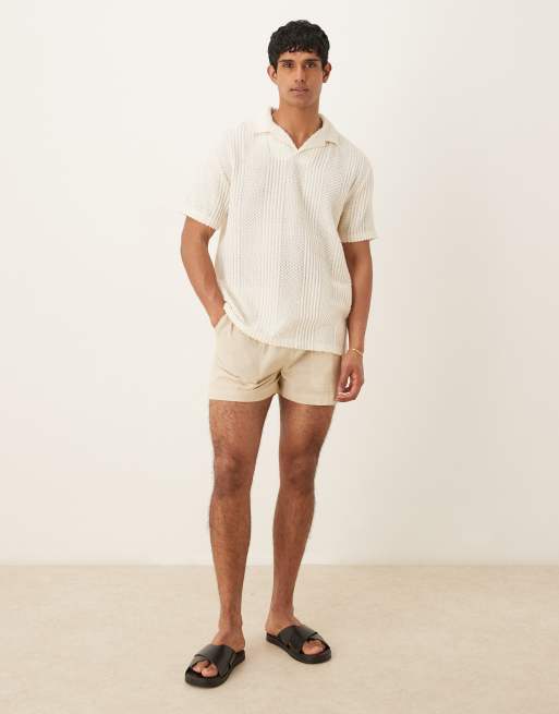 ASOS DESIGN relaxed polo shirt with camp collar in cream texture