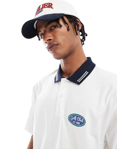 ASOS DESIGN relaxed polo shirt with front golf graphic in white - view 1