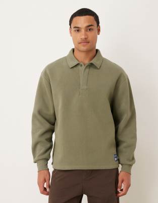ASOS DESIGN relaxed polo sweatshirt with woven label badge in khaki | ASOS