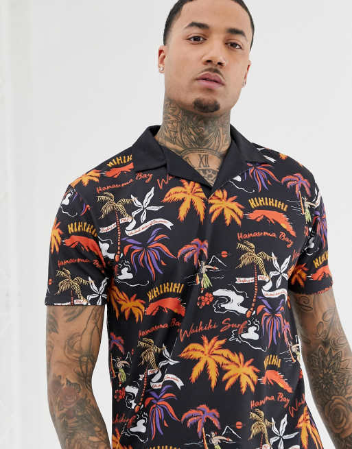 ASOS DESIGN relaxed polo with Hawaii inspired print