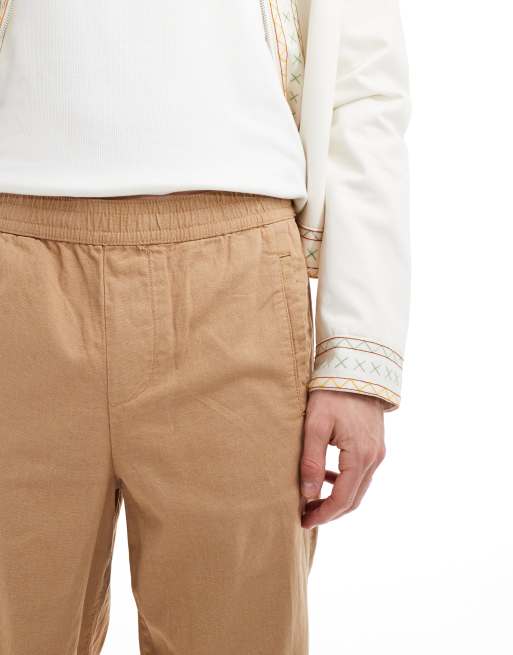 ASOS DESIGN relaxed pull on linen pants in washed tan ASOS