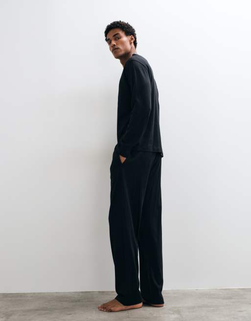 ASOS DESIGN relaxed pyjama set with long sleeve henley in black, 3 of 5