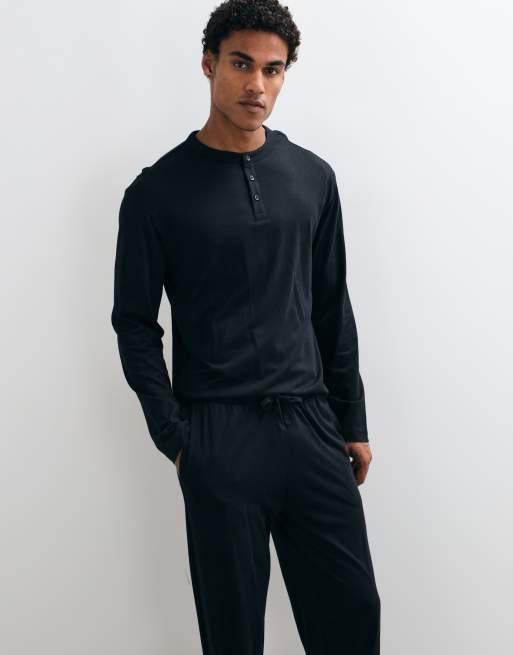ASOS DESIGN relaxed pyjama set with long sleeve henley in black, 4 of 5