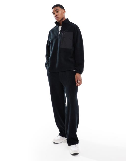 ASOS DESIGN relaxed quarter zip fleece sweatshirt in black with chest pocket, 2 of 4