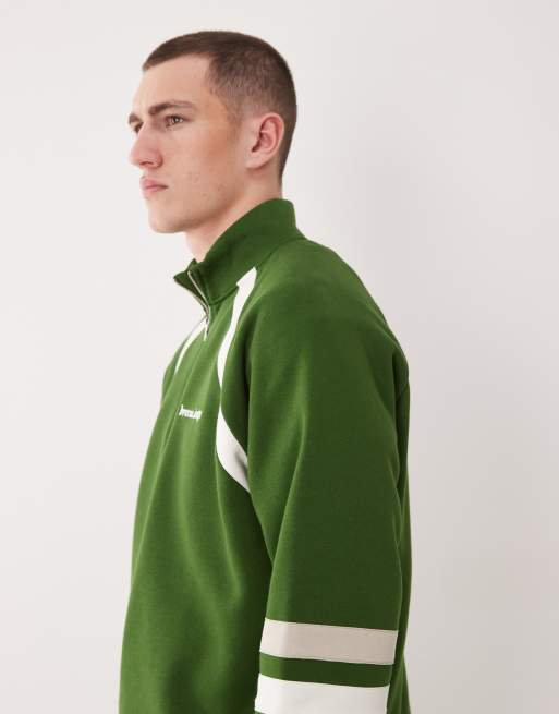 ASOS DESIGN relaxed quarter zip sweatshirt with cut & sew details in green, 4 of 5