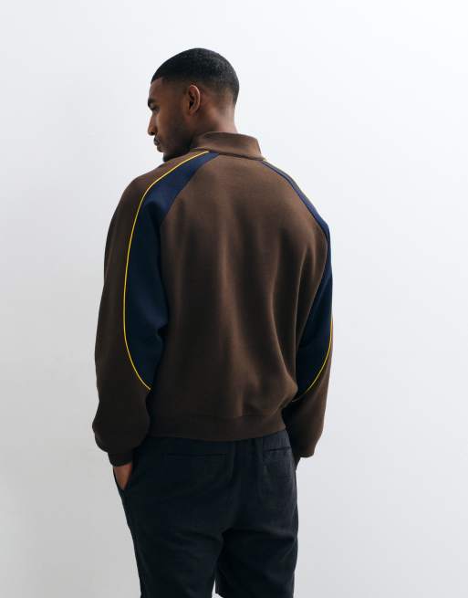 ASOS DESIGN relaxed quarter zip with cut & sew paneling and contrast piping in brown, 4 of 5