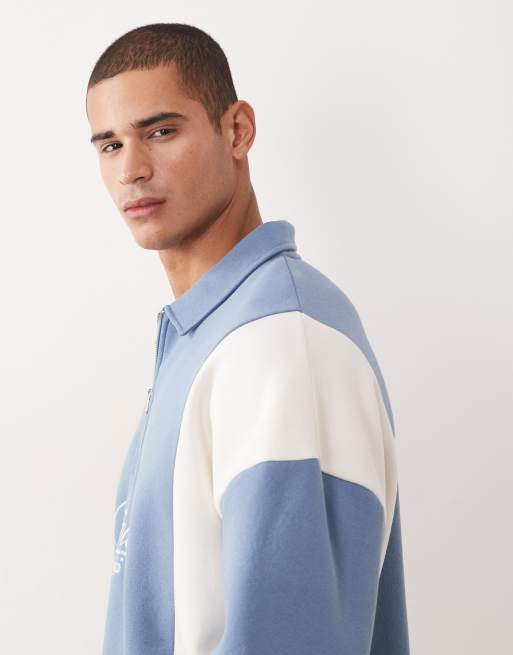ASOS DESIGN relaxed quarter zip with cut & sew panels and embroidered print in blue, 4 of 5