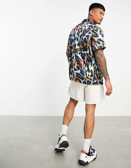 ASOS DESIGN relaxed short sleeve shirt in tiger print with revere collar