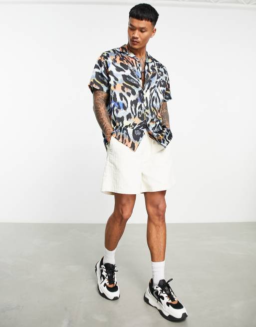 ASOS DESIGN relaxed short sleeve shirt in tiger print with revere collar