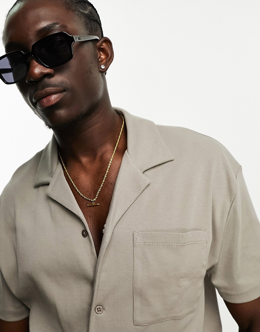 ASOS DESIGN relaxed rib jersey shirt with pocket in brown