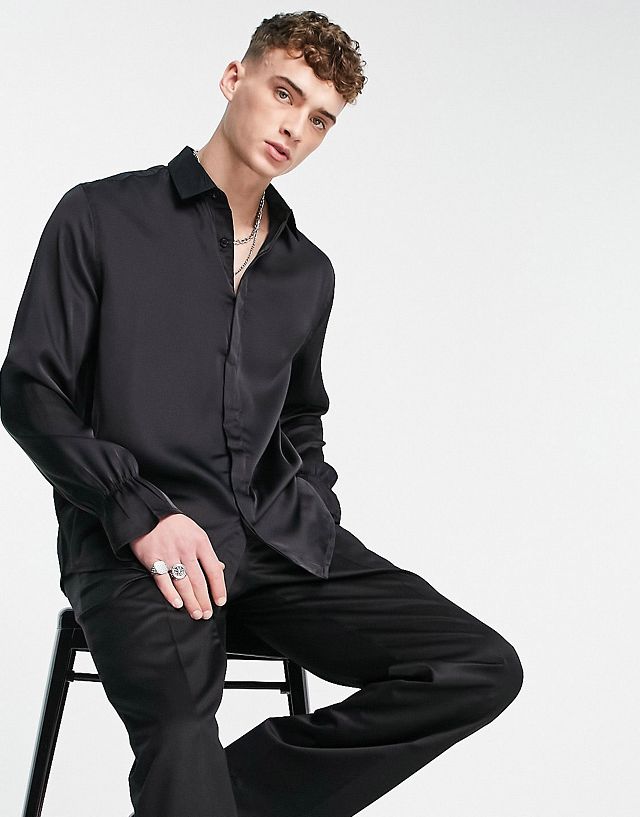 ASOS DESIGN relaxed satin shirt with fluted sleeves in black