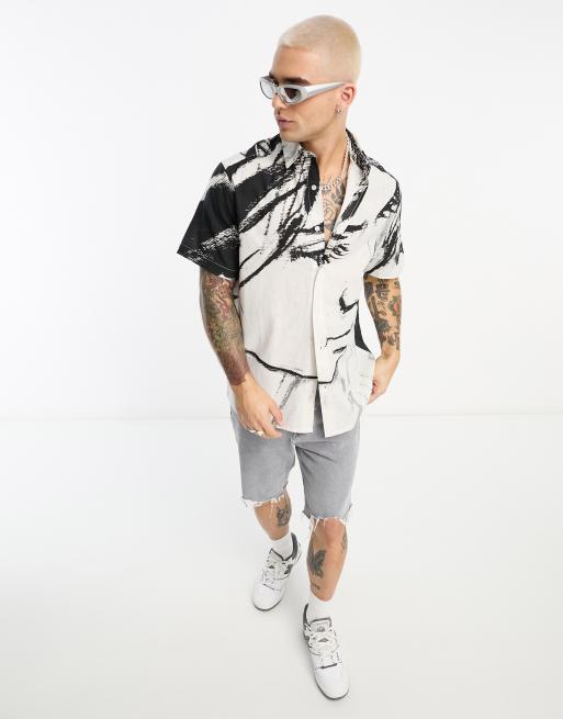 ASOS DESIGN relaxed short sleeve shirt in tiger print with revere collar