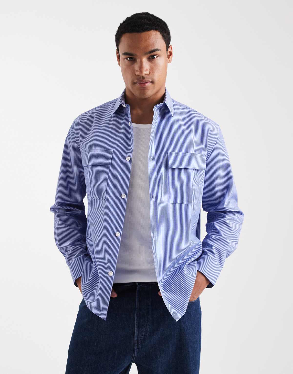 ASOS DESIGN relaxed shirt with cargo pockets in blue stripe
